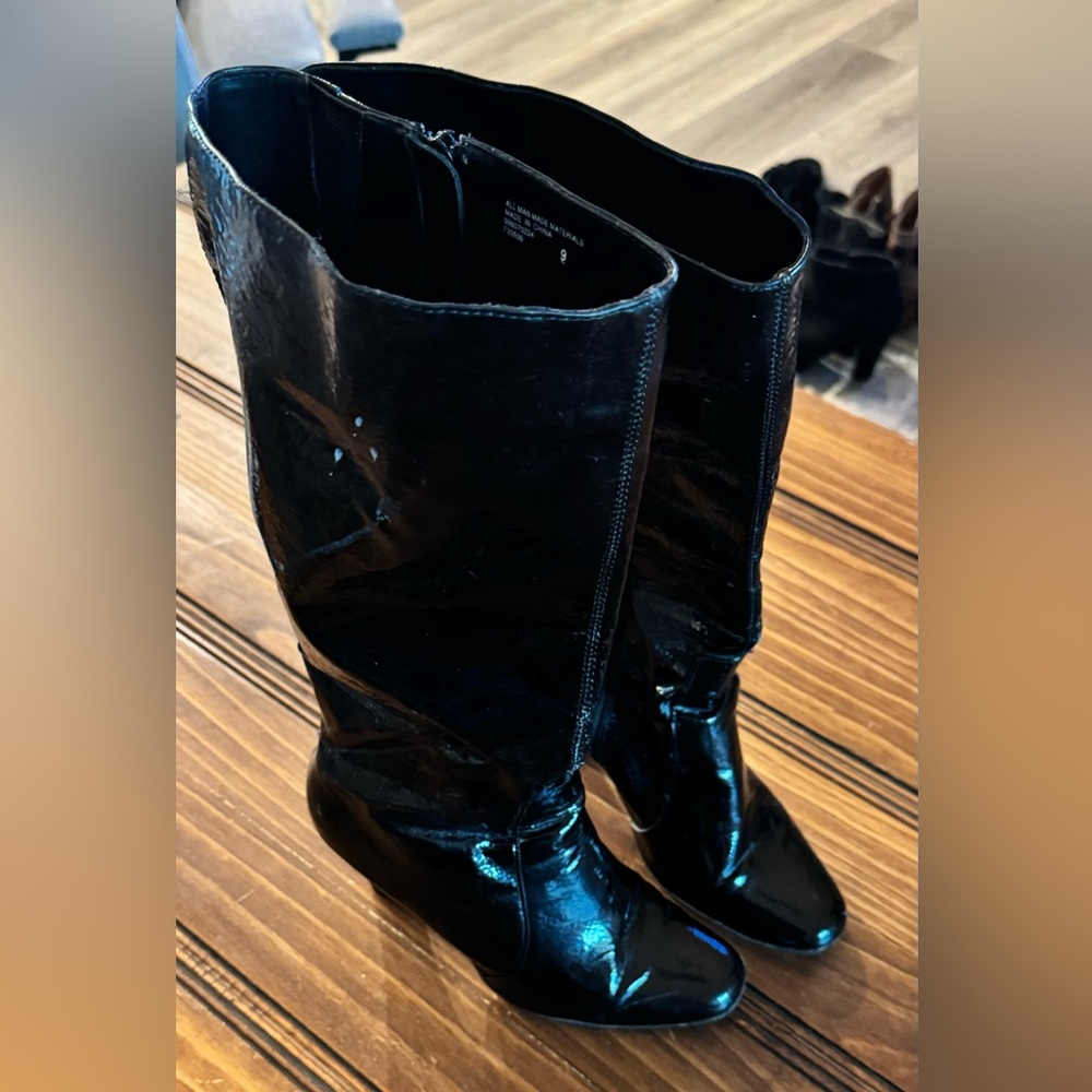 Knee high paten leather boots